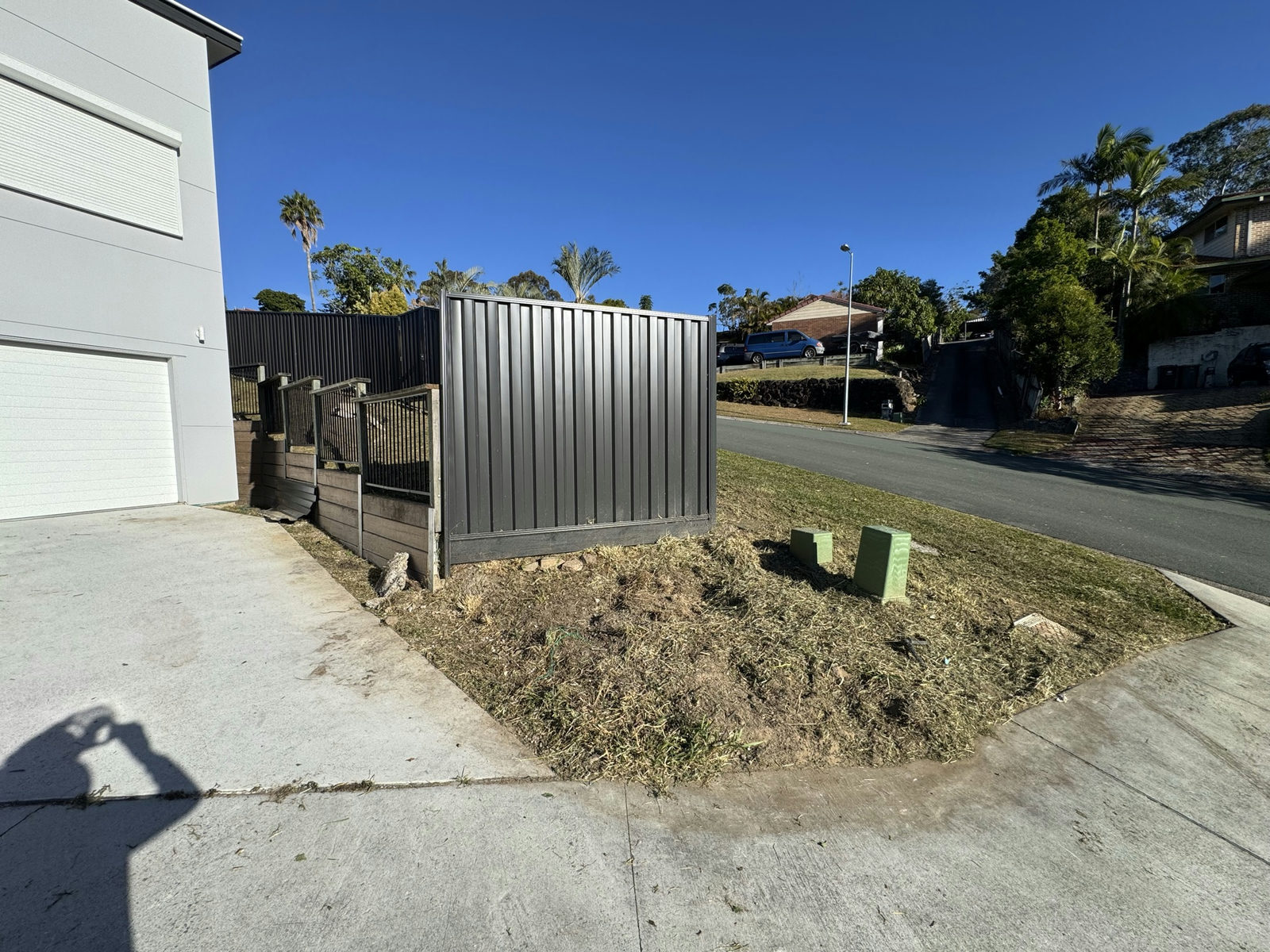 The Edens Landing driveway frontage cleared with the kerb and bin enclosure accessible