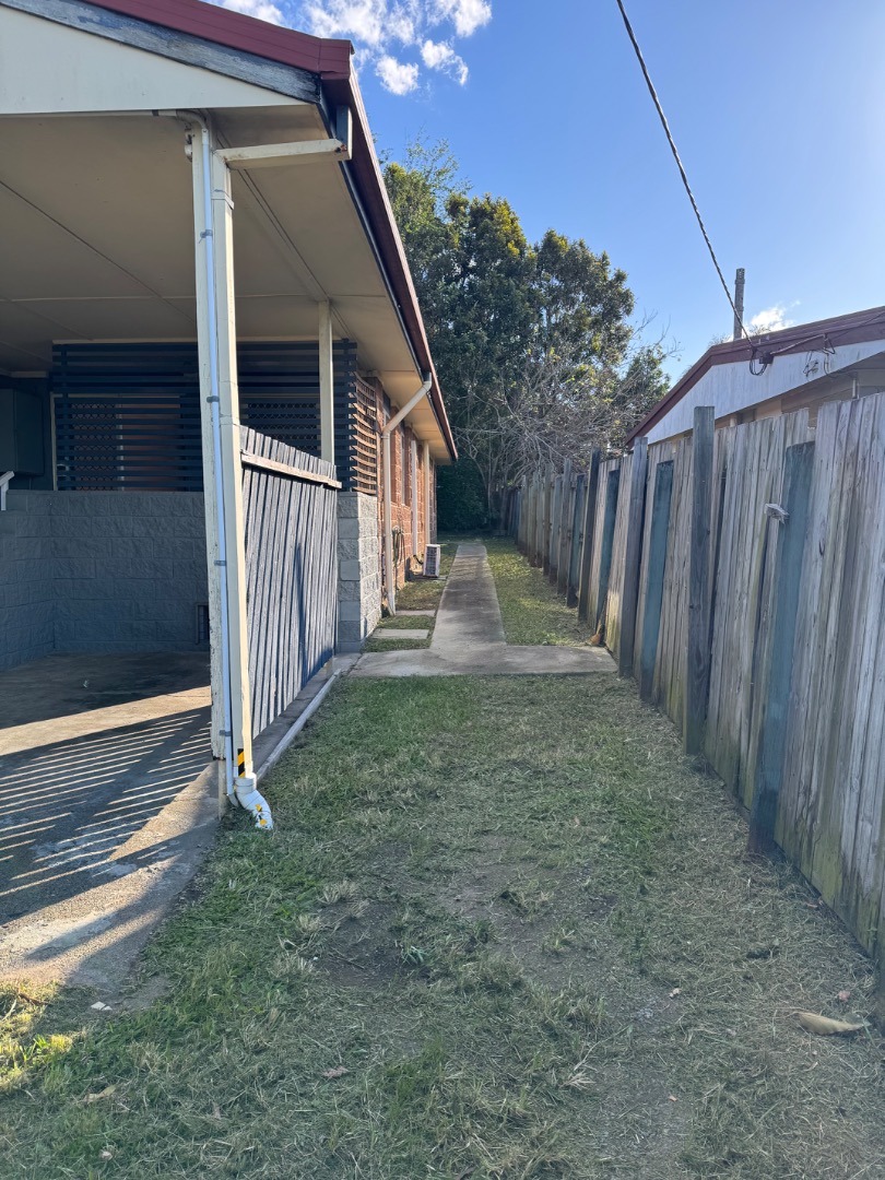 Thumbnail: Woodridge backyard area cleanup - before and after comparison