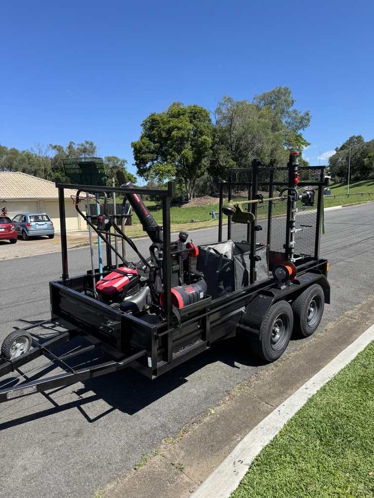 EcoMow professional gardening equipment trailer fully loaded with electric and petrol tools ready for service